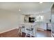Bright kitchen with white cabinets, stainless appliances, and a central island at 4389 S Brooklawn Dr, New Palestine, IN 46163