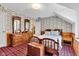 This bedroom features natural light, custom wall decor and ample storage at 4545 W 200 S, Lebanon, IN 46052