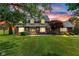 Charming two-story home with brick accents, lush lawn, and beautiful landscaping at 4545 W 200 S, Lebanon, IN 46052