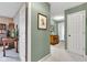 Upstairs hallway with neutral walls, carpet flooring, and several doorways, creating a welcoming and functional space at 4545 W 200 S, Lebanon, IN 46052