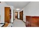 Hallway features carpet flooring and wood cabinets, leading to other rooms of the home at 4545 W 200 S, Lebanon, IN 46052