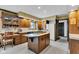 Bright kitchen with custom cabinetry, a center island with cooktop, and modern appliances at 4545 W 200 S, Lebanon, IN 46052