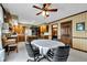 Eat-in kitchen area with wooden cabinetry, tile countertops, and modern appliances at 4545 W 200 S, Lebanon, IN 46052
