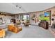 Spacious living room featuring comfortable seating, including a recliner, and charming decor at 4545 W 200 S, Lebanon, IN 46052