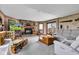 Relaxing living area featuring a brick fireplace, comfortable seating, and a sliding glass door at 4545 W 200 S, Lebanon, IN 46052