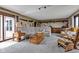 Bright living room with a neutral color palette, large sectional sofa, and a cozy sitting area at 4545 W 200 S, Lebanon, IN 46052