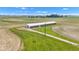 An outbuilding is seen on a vast lot and surrounded by fields at 4545 W 200 S, Lebanon, IN 46052