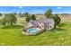 Aerial view showcasing a lovely home with an in-ground pool and outdoor seating area in the backyard at 4545 W 200 S, Lebanon, IN 46052