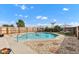 Outdoor in-ground swimming pool with a fun flamingo float and well-kept fenced yard at 4545 W 200 S, Lebanon, IN 46052