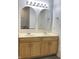 Bathroom featuring double sink vanity, and decorative mirrors at 4767 Kelvington Dr, Indianapolis, IN 46254