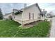 Exterior view of a charming townhouse with well-maintained lawn and vinyl siding at 4767 Kelvington Dr, Indianapolis, IN 46254