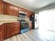 Well-equipped kitchen showcasing stainless steel appliances, ample counter space, and modern cabinetry at 4767 Kelvington Dr, Indianapolis, IN 46254