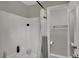 Bright bathroom featuring a shower and bath with neutral-toned walls, complemented by essential toiletries at 5311 Larita Ln, Anderson, IN 46017
