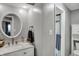 Stylish bathroom with a modern vanity, sleek mirror, and convenient shower area for added comfort at 5311 Larita Ln, Anderson, IN 46017