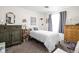 Comfortable bedroom with neutral decor, plush carpeting, and natural light, creating a relaxing and inviting atmosphere at 5357 Collett E Dr, Camby, IN 46113