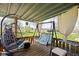 Inviting covered porch with cozy seating, perfect for enjoying the outdoors in a relaxing setting at 5357 Collett E Dr, Camby, IN 46113