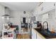 An efficient kitchen featuring white cabinets and modern appliances at 5427 E 19Th St, Indianapolis, IN 46218