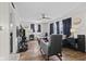 Inviting living room with wood floors, offering comfortable seating and an entertainment setup at 5427 E 19Th St, Indianapolis, IN 46218