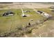 Scenic aerial view of multiple houses and buildings with long driveways, and lush lawn areas at 5679 S 675 W, New Palestine, IN 46163