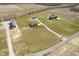 Aerial view of a home with well-kept lawn, buildings, and driveway at 5679 S 675 W, New Palestine, IN 46163