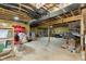 Large unfinished basement with exposed ductwork and ample storage space at 5679 S 675 W, New Palestine, IN 46163