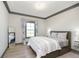 Bright bedroom with a plush bed, natural light, and modern decor at 5679 S 675 W, New Palestine, IN 46163