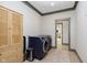 Functional laundry room with modern machines and wood accent cabinet at 5679 S 675 W, New Palestine, IN 46163