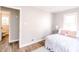 Charming bedroom with a bright and airy atmosphere with an en suite bathroom entrance at 5820 Bonnie Brae St, Indianapolis, IN 46228