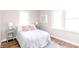 Comfortable bedroom with abundant natural light and modern accents for a relaxing retreat at 5820 Bonnie Brae St, Indianapolis, IN 46228