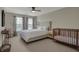 Main bedroom with a neutral color scheme, lots of windows, and a crib at 6037 Porter Ln, Noblesville, IN 46062