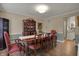 Formal dining room featuring a large wooden table, chairs, and hardwood floors at 6037 Porter Ln, Noblesville, IN 46062
