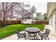 Private backyard features a seating area perfect for outdoor dining and relaxation at 6041 Garver Rd, Indianapolis, IN 46208
