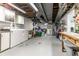 Spacious unfinished basement offers laundry area, storage, and potential for customization at 6041 Garver Rd, Indianapolis, IN 46208