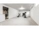 Spacious basement area with white-painted walls and versatile space for recreation and storage at 6041 Garver Rd, Indianapolis, IN 46208
