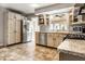 Spacious kitchen featuring stainless steel appliances and ample storage at 6041 Garver Rd, Indianapolis, IN 46208