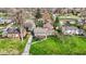 Aerial view of a home surrounded by mature trees and well-maintained lawns at 6377 Green Leaves Rd, Indianapolis, IN 46220