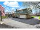 Spacious home features an attached garage, stone and siding exterior, and well-maintained landscaping at 6377 Green Leaves Rd, Indianapolis, IN 46220