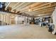 Unfinished basement featuring a concrete floor and exposed wood and ceiling beams at 6557 Eagles Nest Ln, McCordsville, IN 46055