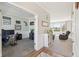 Open-concept space featuring a home office and a view into a bright living area at 6557 Eagles Nest Ln, McCordsville, IN 46055