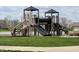 The playground includes bridges, slides, benches, and picnic tables for families to gather and enjoy the outdoors at 6557 Eagles Nest Ln, McCordsville, IN 46055