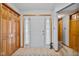 Bright entryway with a closet, neutral tile flooring, and sidelights flanking the front door at 760 Sable Ridge Dr, Greenwood, IN 46142