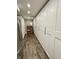 Walk-in pantry with ample shelving space and overhead lighting for organized storage at 7809 S Solitude Ln, Trafalgar, IN 46181