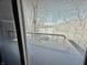 Peaceful view of a lake and woods visible through window blinds at 7809 S Solitude Ln, Trafalgar, IN 46181