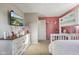 Bedroom offers a charming retreat with bunk beds, dresser and television at 8017 Wallingwood Dr, Indianapolis, IN 46256