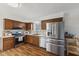 Well-equipped kitchen with stainless steel appliances and plenty of cabinet space at 8017 Wallingwood Dr, Indianapolis, IN 46256