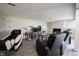 Finished basement area with a fireplace, mounted TV, and reclining seats at 8075 N Cardinal W Cv, Indianapolis, IN 46256
