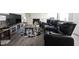 Finished basement area with a fireplace, mounted TV, and reclining seats at 8075 N Cardinal W Cv, Indianapolis, IN 46256