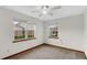 Neutral bedroom with two windows with backyard views at 8242 Frankdale Ct, Indianapolis, IN 46259