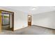 Neutral bedroom featuring a view to the kitchen and bathroom at 8242 Frankdale Ct, Indianapolis, IN 46259