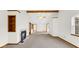 Large living room featuring vaulted ceiling, fireplace and neutral carpeting at 8242 Frankdale Ct, Indianapolis, IN 46259